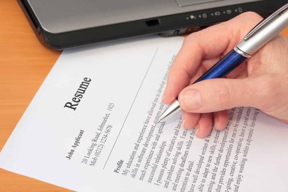 A man works through his resume